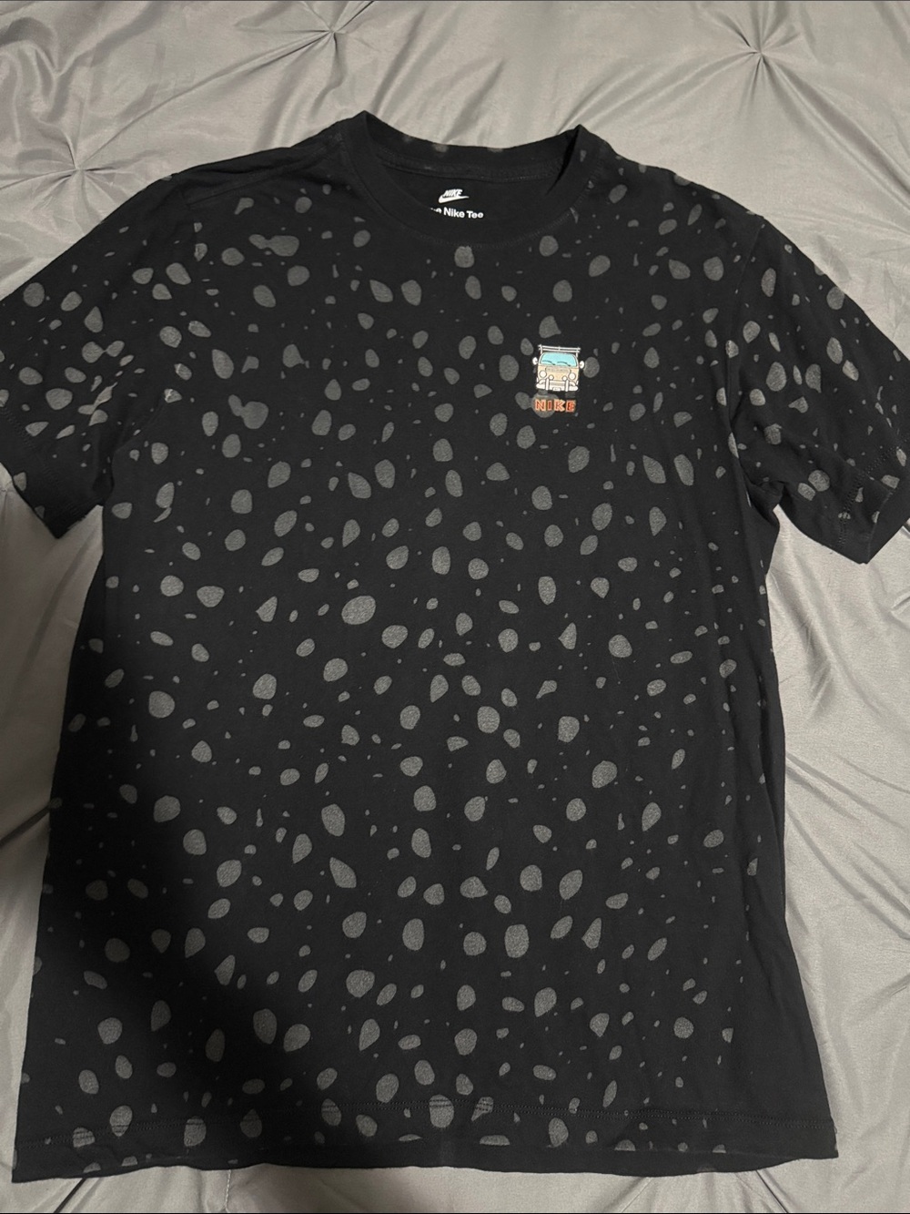 Nike Black Short-Sleeve Graphic Tee with Speckle Pattern